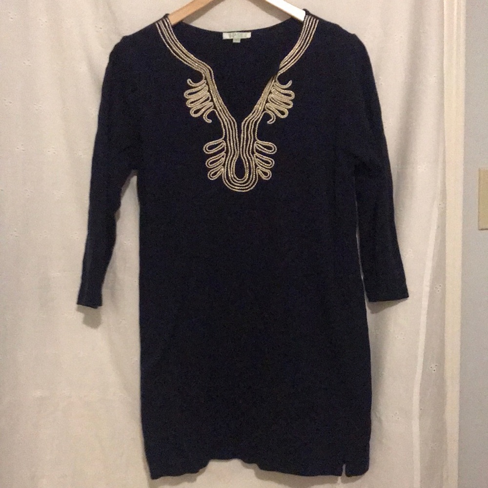 Jade navy tunic with gold-white accented neckline